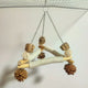 A large bird swing with a cage for chewing toys, 3 bird pads wrapped in sisal, and a stable triangular design, a wooden hanging toy swing (small)