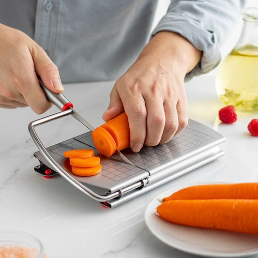 A stainless steel cheese slicer with scales-With scale