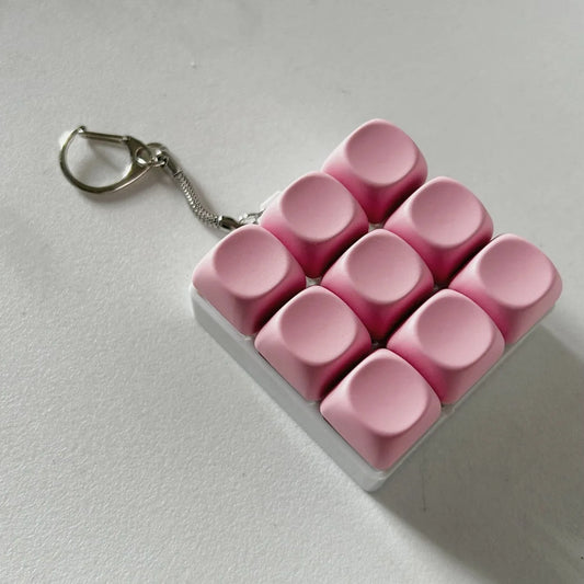 2-Pack Dark Pink Mechanical 9-Keyboard Fingertip Toy Keychain - Key Pressure Relief, PVC Fingertip Toy - Mekamart Australia
